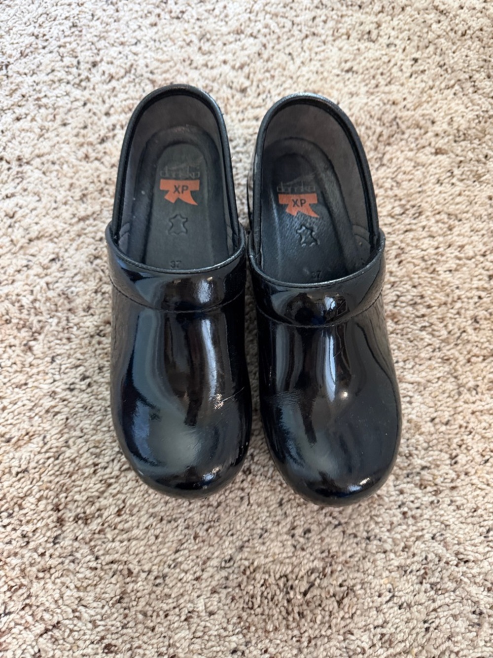 Dansko XP Black Patent Slip-On Clogs